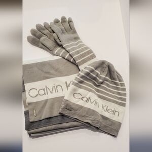 Calvin Klein scarf, gloves and hat. One size. Gray and white stripe